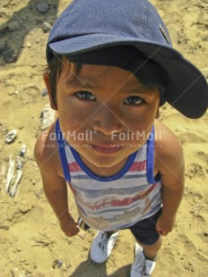 Fair Trade Photo 5 -10 years, Activity, Colour image, Cute, Day, Hat, High angle view, Latin, Looking at camera, One boy, Outdoor, People, Peru, Portrait fullbody, South America, Vertical