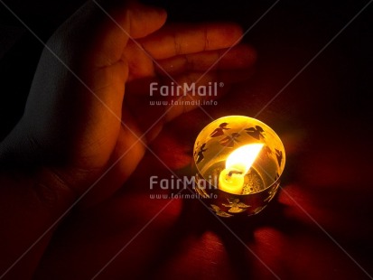 Fair Trade Photo Candle, Christmas, Colour image, Flame, Hand, Horizontal, Indoor, Peru, South America, Spirituality, Tabletop