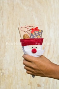 Fair Trade Photo Activity, Adjective, Body, Celebrating, Christmas, Christmas decoration, Colour, Cone, Gift, Hand, Nature, Object, Present, Red, Vertical, White