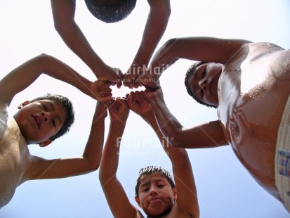 Fair Trade Photo 10-15 years, Activity, Colour image, Cooperation, Group of boys, Group of children, Growth, Horizontal, Latin, Low angle view, People, Peru, Playing, Seasons, South America, Summer, Together, Tolerance, Values, Water