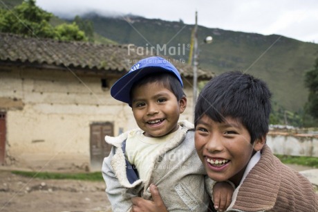 Fair Trade Photo Activity, Colour image, Day, Friendship, Horizontal, House, Latin, Looking at camera, Mountain, Outdoor, People, Peru, Playing, Portrait halfbody, Rural, Smiling, South America, Street, Streetlife, Two boys