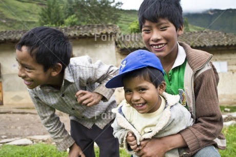 Fair Trade Photo Activity, Colour image, Day, Friendship, Group of boys, Horizontal, House, Mountain, Outdoor, People, Peru, Playing, Portrait halfbody, Rural, Smiling, South America, Street, Streetlife
