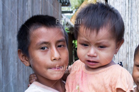 Fair Trade Photo Activity, Brother, Care, Crying, Day, Family, Horizontal, Latin, Looking at camera, One baby, Outdoor, Peru, Portrait headshot, South America