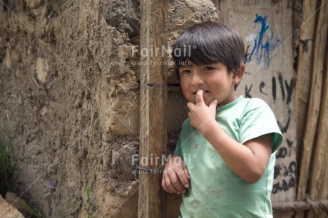 Fair Trade Photo 5 -10 years, Activity, Casual clothing, Clothing, Day, Horizontal, House, Latin, Looking at camera, One boy, Outdoor, People, Portrait halfbody, Rural