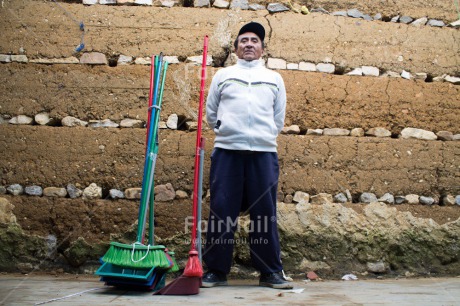 Fair Trade Photo 40-45 years, Activity, Cleaning, Day, Entrepreneurship, Horizontal, Latin, Looking at camera, Low angle view, One man, Outdoor, People, Portrait fullbody, Rural, Selling