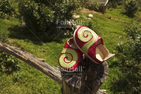 Fair Trade Photo Birth, Colour image, Day, Garden, Green, Horizontal, Nature, New baby, Outdoor, Peru, Red, Seasons, Shoe, South America, Summer