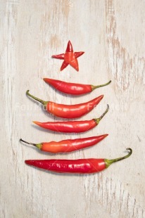Fair Trade Photo Christmas, Christmas decoration, Christmas tree, Colour, Colour image, Food and alimentation, Object, Pepper, Peru, Place, Red, South America, Star, Vegetable, Vertical, White