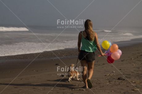 Fair Trade Photo Activity, Animals, Balloon, Beach, Birthday, Colour image, Dog, Horizontal, One girl, Party, People, Peru, Sea, South America, Summer, Walking