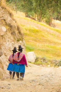 Fair Trade Photo Activity, Clothing, Colour image, Culture, Day, Latin, Nature, Outdoor, People, Peru, Rural, South America, Traditional clothing, Vertical, Walking, Woman