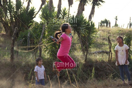 Fair Trade Photo Activity, Colour image, Day, Emotions, Group of girls, Happiness, Jumping, Latin, Outdoor, People, Peru, Playing, Rural, Smiling, South America, Sport