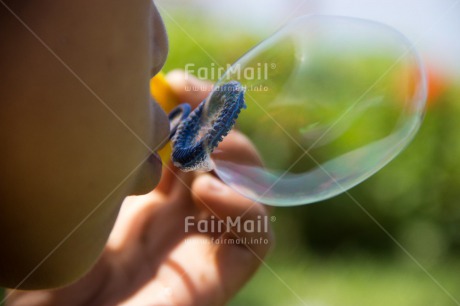 Fair Trade Photo Activity, Closeup, Dreaming, Hope, Horizontal, One boy, People, Peru, Playing, Soapbubble, South America, Transparent, Water