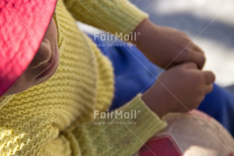 Fair Trade Photo Activity, Ball, Casual clothing, Closeup, Clothing, High angle view, Horizontal, Latin, Looking away, One girl, People, Peru, Portrait halfbody, Soccer, South America