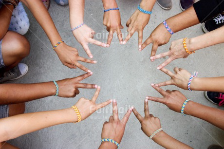 Fair Trade Photo Closeup, Colour image, Cooperation, Discrimination, Friendship, Group of People, Hand, Horizontal, Outdoor, People, Peru, Sharing, Shooting style, South America, Star, Together, Tolerance, Values