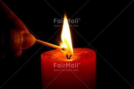 Fair Trade Photo Candle, Christmas, Closeup, Colour image, Condolence-Sympathy, Flame, Hand, Horizontal, Match, Peru, Red, Shooting style, South America