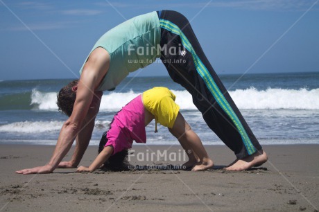 Fair Trade Photo Beach, Colour image, Cooperation, Cute, Friendship, Health, Horizontal, Love, One girl, One man, Outdoor, People, Peru, Sea, South America, Summer, Together, Wellness, Yoga