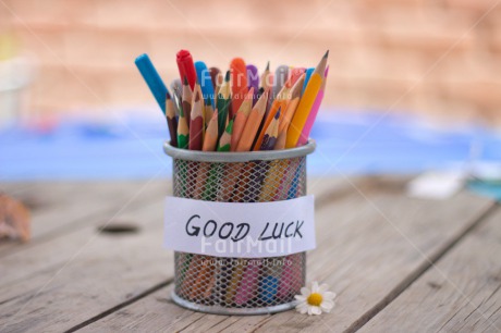 Fair Trade Photo Business, Colour image, Crayon, Daisy, Desk, Exams, Flower, Good luck, Horizontal, Multi-coloured, Office, Peru, School, South America, Table, Text, Wood