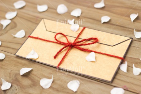 Fair Trade Photo Colour image, Envelope, Flowers, Horizontal, Indoor, Invitation, Leaf, Letter, Love, Marriage, Message, Peru, Red, Ribbon, South America, Table, Wedding, White, Wood