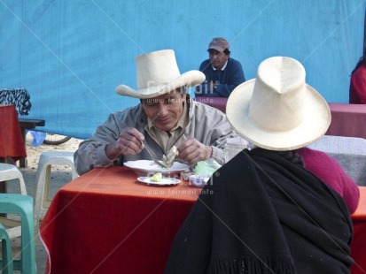 Fair Trade Photo Activity, Clothing, Colour image, Day, Eating, Farmer, Food and alimentation, Group of People, Horizontal, Indoor, People, Peru, Rural, Sitting, South America, Traditional clothing