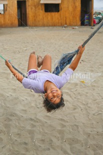 Fair Trade Photo Activity, Child, Colour image, Emotions, Felicidad sencilla, Girl, Happiness, Happy, Holiday, New beginning, People, Peru, Play, Playing, Smiling, South America, Swing, Swinging, Vertical
