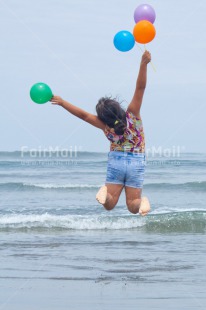 Fair Trade Photo Activity, Balloon, Beach, Child, Colour image, Congratulations, Emotions, Felicidad sencilla, Girl, Happiness, Happy, Holiday, Jump, Jumping, New beginning, Party, People, Peru, Play, Playing, Sea, South America, Vertical
