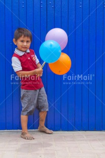 Fair Trade Photo Activity, Balloon, Blue, Boy, Child, Colour image, Emotions, Felicidad sencilla, Happiness, Happy, Party, People, Peru, Play, Playing, Smiling, South America, Vertical