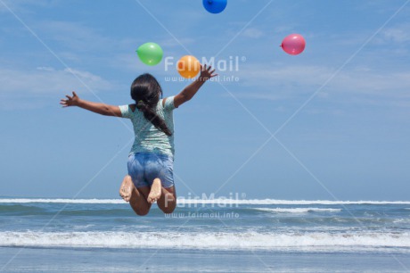 Fair Trade Photo Activity, Balloon, Beach, Child, Colour image, Congratulations, Emotions, Felicidad sencilla, Girl, Happiness, Happy, Holiday, Horizontal, Jump, Jumping, New beginning, People, Peru, Play, Playing, Sea, South America