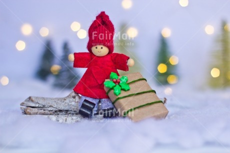 Fair Trade Photo Activity, Adjective, Celebrating, Christmas, Christmas decoration, Christmas tree, Colour, Doll, Gift, Horizontal, Light, Nature, Object, Present, Red, Snow