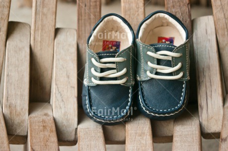 Fair Trade Photo Birth, Boy, Closeup, Colour image, Horizontal, New baby, People, Peru, Shoe, Shooting style, South America, Wood