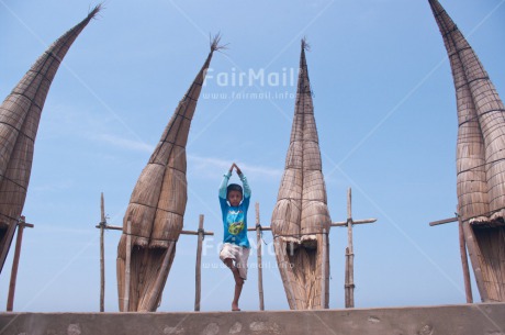 Fair Trade Photo Beach, Colour image, Fishing boat, Health, Horizontal, One boy, Outdoor, Peace, People, Peru, Sea, South America, Wellness, Yoga