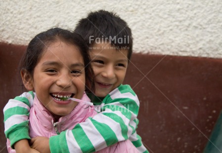 Fair Trade Photo Colour image, Emotions, Family, Happiness, Horizontal, People, Peru, Portrait halfbody, Smiling, South America, Streetlife, Together, Two children