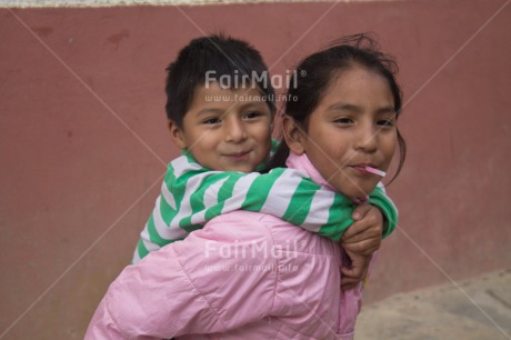 Fair Trade Photo Colour image, Emotions, Family, Happiness, Horizontal, People, Peru, Portrait halfbody, Smiling, South America, Streetlife, Together, Two children