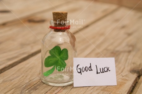 Fair Trade Photo Bottle, Clover, Colour image, Cork, Desk, Exams, Glass, Good luck, Green, Horizontal, Peru, School, South America, Success, Table, Text, White, Wood