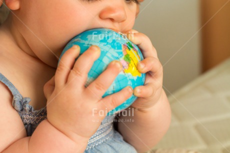 Fair Trade Photo Activity, Baby, Biting, Caucasian, Colour image, Globe, Hands, Holding, Horizontal, Multi-coloured, People, Peru, South America, Travel, Travelling, World