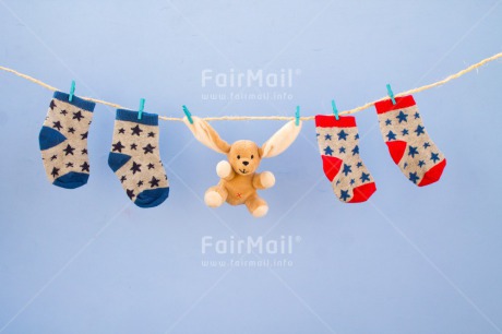 Fair Trade Photo Animals, Birth, Boy, Clothing, Colour image, Hanging, Horizontal, New baby, Peg, People, Peru, Rabbit, Sock, Son, South America, Toy