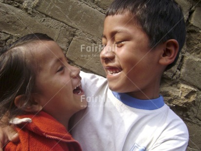 Fair Trade Photo 5-10 years, Activity, Brother, Care, Casual clothing, Clothing, Colour image, Cute, Day, Emotions, Family, Happiness, Horizontal, Hugging, Latin, Looking away, Love, Outdoor, People, Peru, Playing, Portrait headshot, Sister, Smile, Smiling, South America, Two children