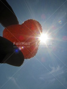 Fair Trade Photo Backlit, Closeup, Colour image, Hand, Heart, Light, Love, Peru, Red, Sky, South America, Sun, Sweets, Thinking of you, Valentines day, Vertical