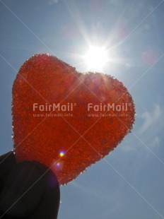 Fair Trade Photo Backlit, Closeup, Colour image, Hand, Heart, Light, Love, Peru, Red, Sky, South America, Sun, Sweets, Thinking of you, Valentines day, Vertical