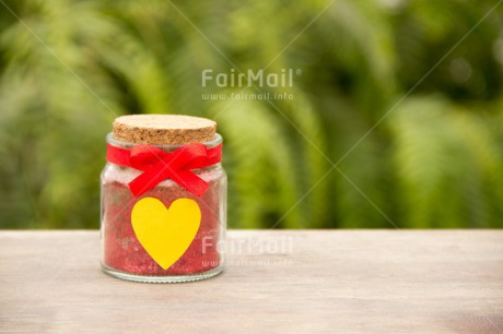 Fair Trade Photo Colour image, Fathers day, Glass, Green, Heart, Horizontal, Love, Mothers day, Nature, Peru, Red, Ribbon, South America, Table, Valentines day, Wood, Yellow