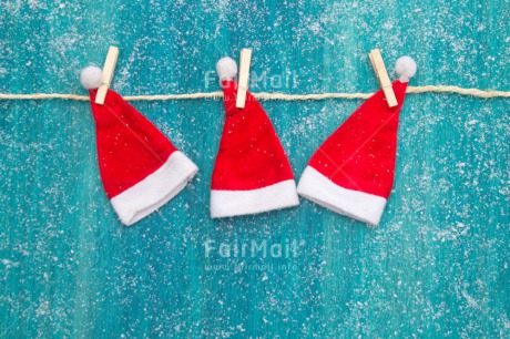 Fair Trade Photo Blue, Christmas, Clothing, Colour image, Hanging, Hat, Peru, Red, Santaclaus, Seasons, Snow, South America, Three, White, Winter