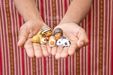 Fair Trade Photo Activity, Adjective, Body, Celebrating, Christianity, Christmas, Christmas decoration, Creche, Ethnic, Family, Hand, Horizontal, Object, People, Peruvian fabric, Present