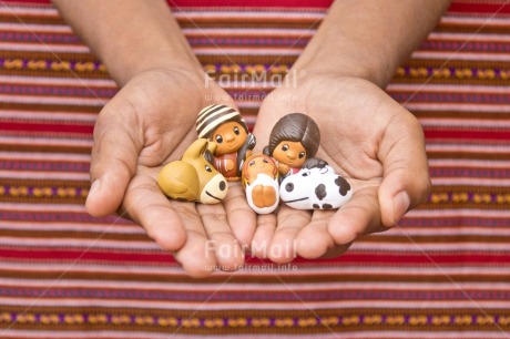 Fair Trade Photo Activity, Adjective, Body, Celebrating, Christianity, Christmas, Christmas decoration, Creche, Ethnic, Family, Hand, Horizontal, Object, People, Peruvian fabric, Present