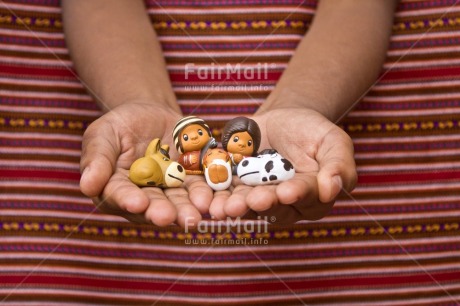 Fair Trade Photo Activity, Adjective, Body, Celebrating, Christianity, Christmas, Christmas decoration, Creche, Ethnic, Family, Hand, Horizontal, Object, People, Peruvian fabric, Present