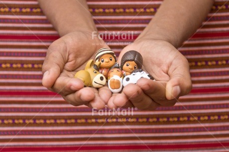 Fair Trade Photo Activity, Adjective, Body, Celebrating, Christianity, Christmas, Christmas decoration, Creche, Ethnic, Family, Hand, Horizontal, Object, People, Peruvian fabric, Present