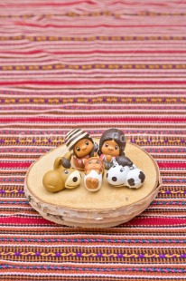 Fair Trade Photo Activity, Adjective, Celebrating, Christianity, Christmas, Christmas decoration, Creche, Ethnic, Family, Object, People, Peruvian fabric, Present, Vertical