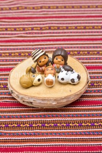 Fair Trade Photo Activity, Adjective, Celebrating, Christianity, Christmas, Christmas decoration, Creche, Ethnic, Family, Object, People, Peruvian fabric, Present, Vertical