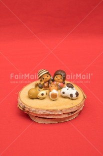 Fair Trade Photo Activity, Adjective, Celebrating, Christianity, Christmas, Christmas decoration, Colour, Creche, Family, Object, People, Present, Red, Vertical