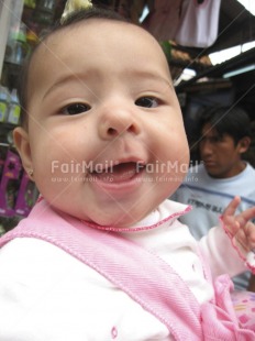 Fair Trade Photo Baby, Colour image, Cute, Day, Funny, Market, Outdoor, People, Peru, Portrait headshot, Smile, Smiling, South America, Vertical