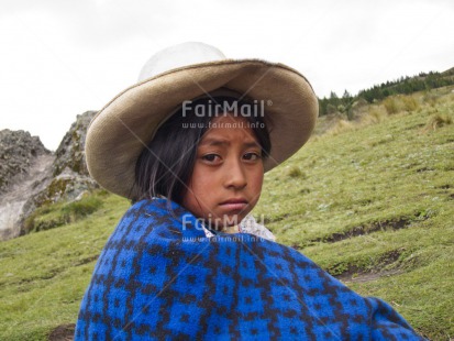 Fair Trade Photo 5 -10 years, Activity, Clothing, Day, Emotions, Ethnic-folklore, Horizontal, Latin, Looking at camera, One girl, Outdoor, People, Portrait halfbody, Rural, Sadness, Sombrero, Traditional clothing
