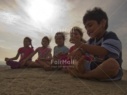 Fair Trade Photo 5 -10 years, Activity, Casual clothing, Clothing, Colour image, Evening, Group of children, Horizontal, Latin, Meditating, Outdoor, People, Peru, Sitting, South America, Yoga