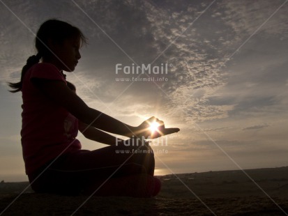 Fair Trade Photo Activity, Clouds, Colour image, Evening, Horizontal, Light, Meditating, One girl, Outdoor, People, Peru, Sitting, Sky, South America, Sunset, Yoga